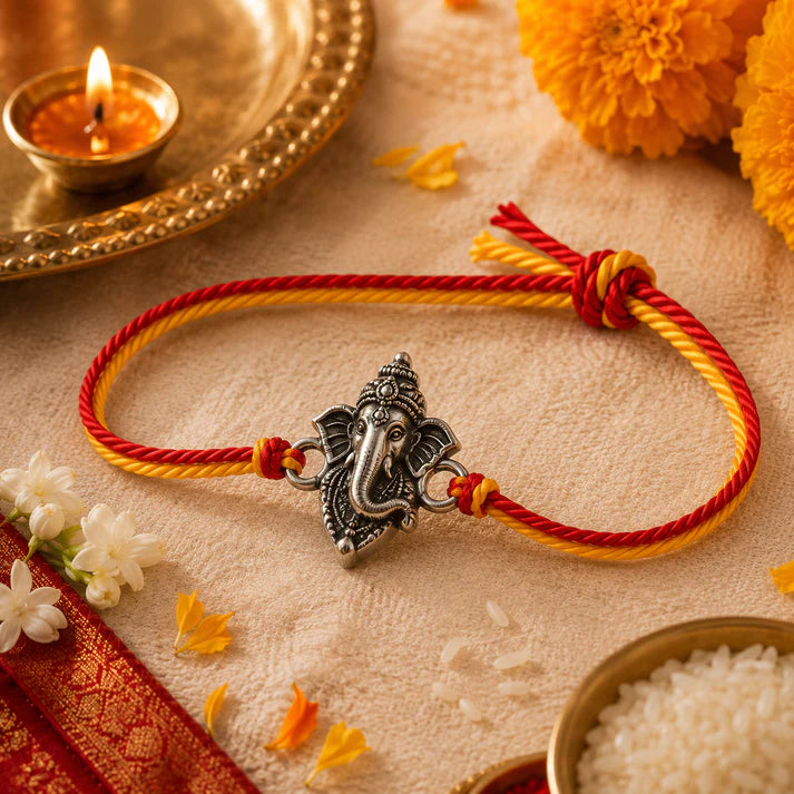 Vighnaharta Ganesha Rakhi – Silver-Tone Ganpati Charm